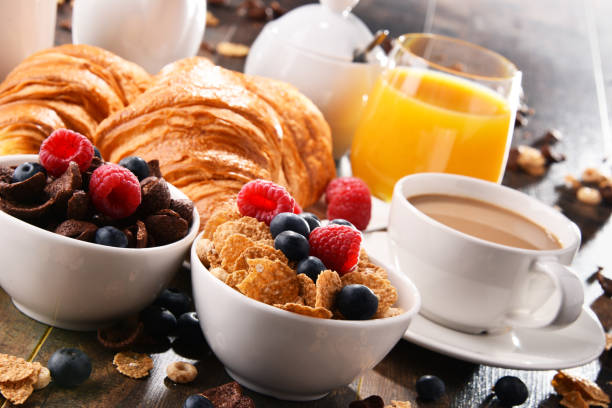 Breakfast served with coffee, orange juice, croissants, cereals and fruits. Balanced diet at the autograph inn
